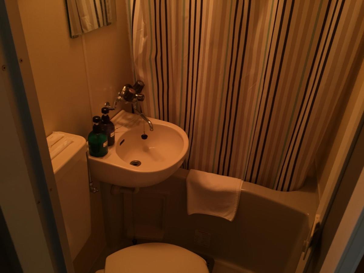 Urban Hotel Morishita Токио Стая снимка
